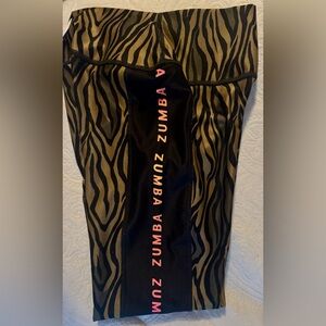 High-waisted black and gold ankle leggings